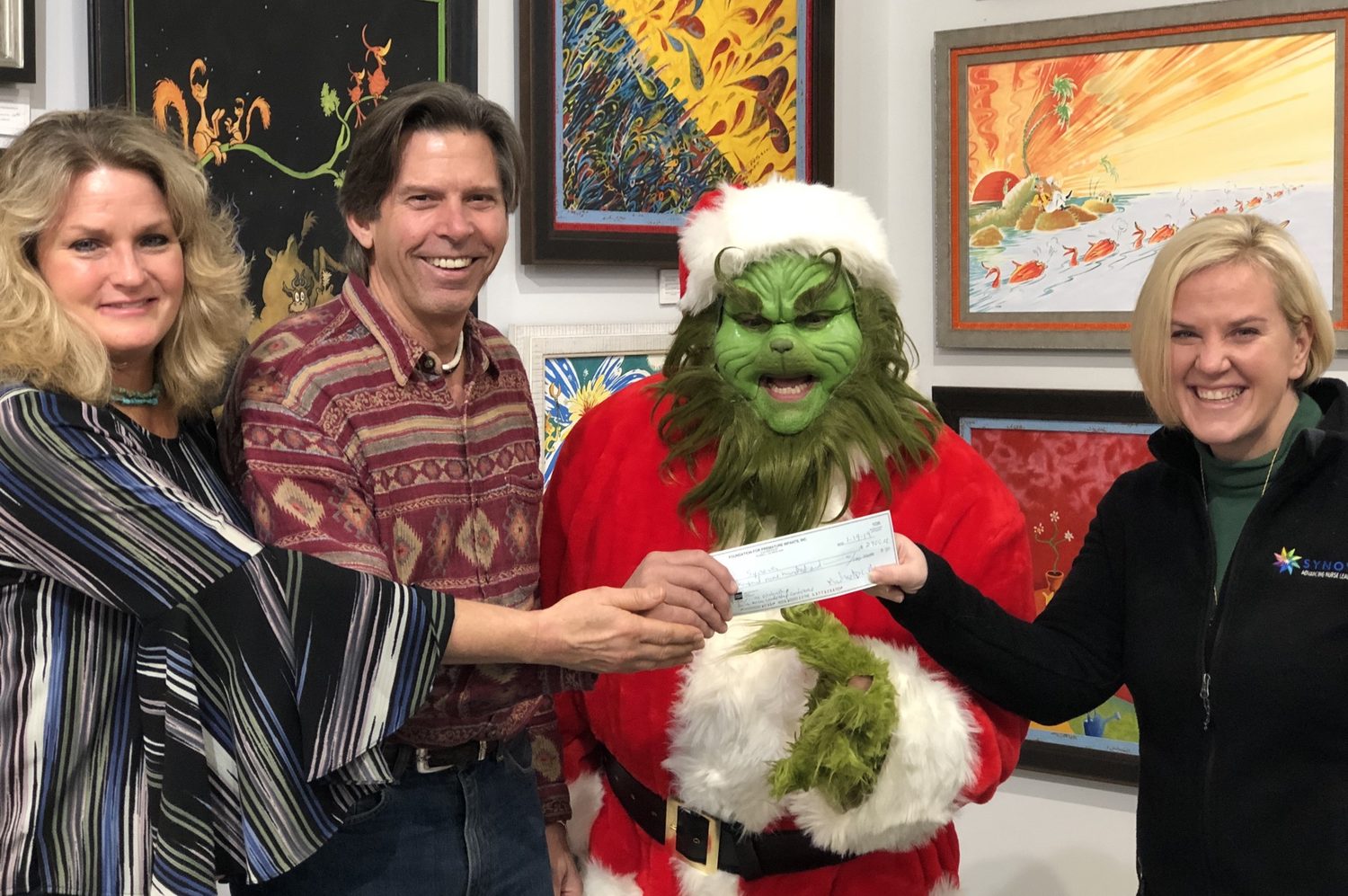 Michael D. Litten Presents Donation to Synova Associates for NICU Leadership Forum Scholarships